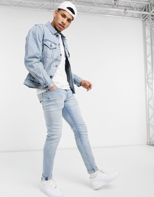 Levi's vintage relaxed fit denim trucker jacket in extreme light wash | ASOS