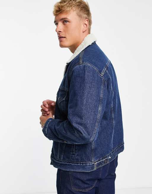 Levi s vintage relaxed fit sherpa lined denim trucker jacket in dark wash blue