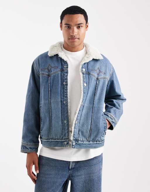 Levi's western embroidered teddy denim trucker jacket in mid wash