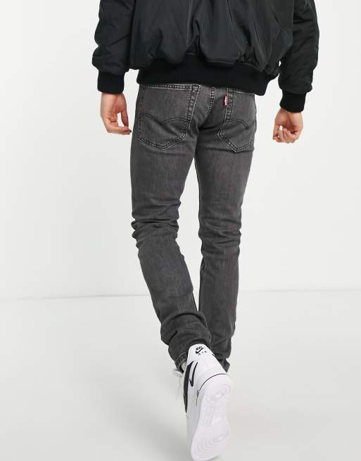 Levi's x ASOS exclusive 512 slim tapered jeans in black wash with knee  abraisons | ASOS