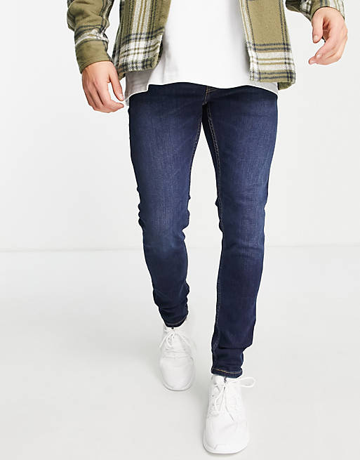 Levi's x ASOS exclusive 519 super skinny jeans in dark blue wash | ASOS