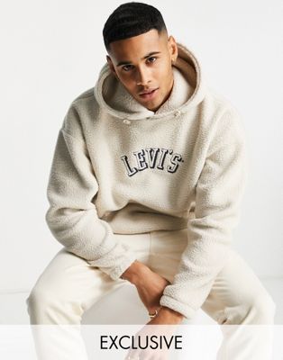 Levi's x ASOS exclusive poler fleece hoodie with collegiate logo in cream