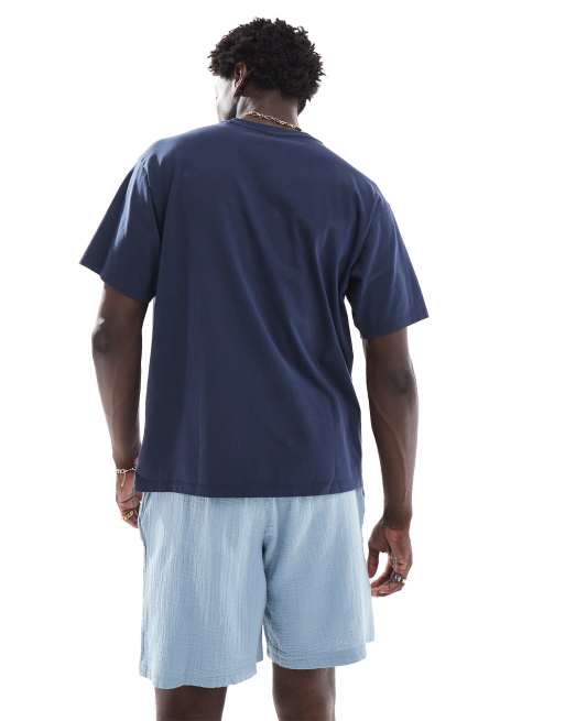 Levi's x ASOS - Exclusives - T-shirt met retro logo op de borst in donkerblauw, 2 van 4