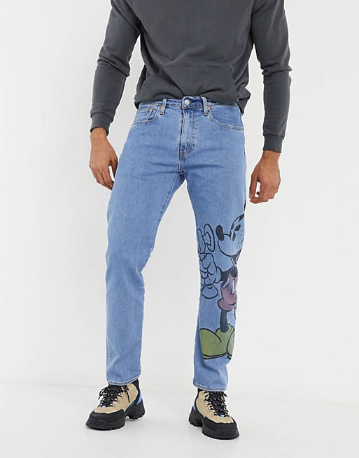 Levi's x Disney jeans with large Mickey Mouse graphic in blue mid wash |  ASOS