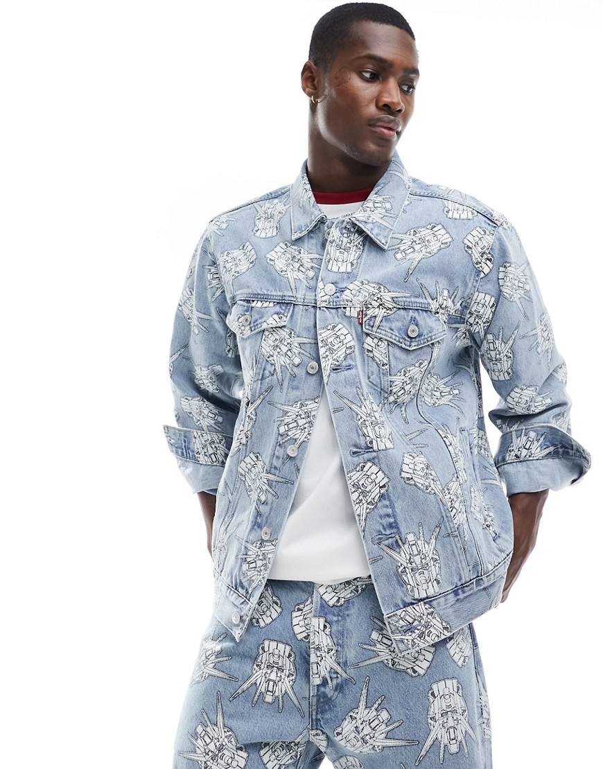 Levi’s X Gundam collab starfighter all over print relaxed fit denim trucker jacket in light wash-Blue