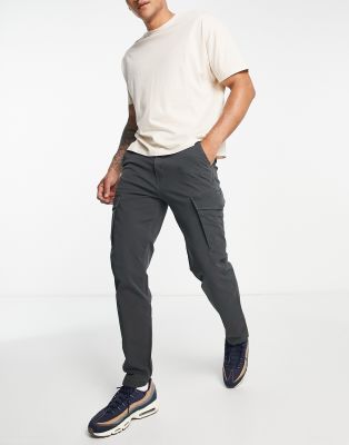 Levi's xx slim taper cargo trousers with pockets in black | ASOS
