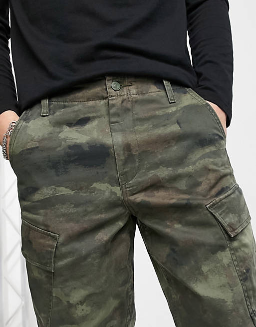 Levi's XX taper fit ocean camo print cargo pants in burnt olive | ASOS