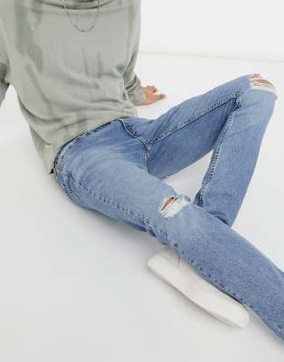 tapered distressed jeans