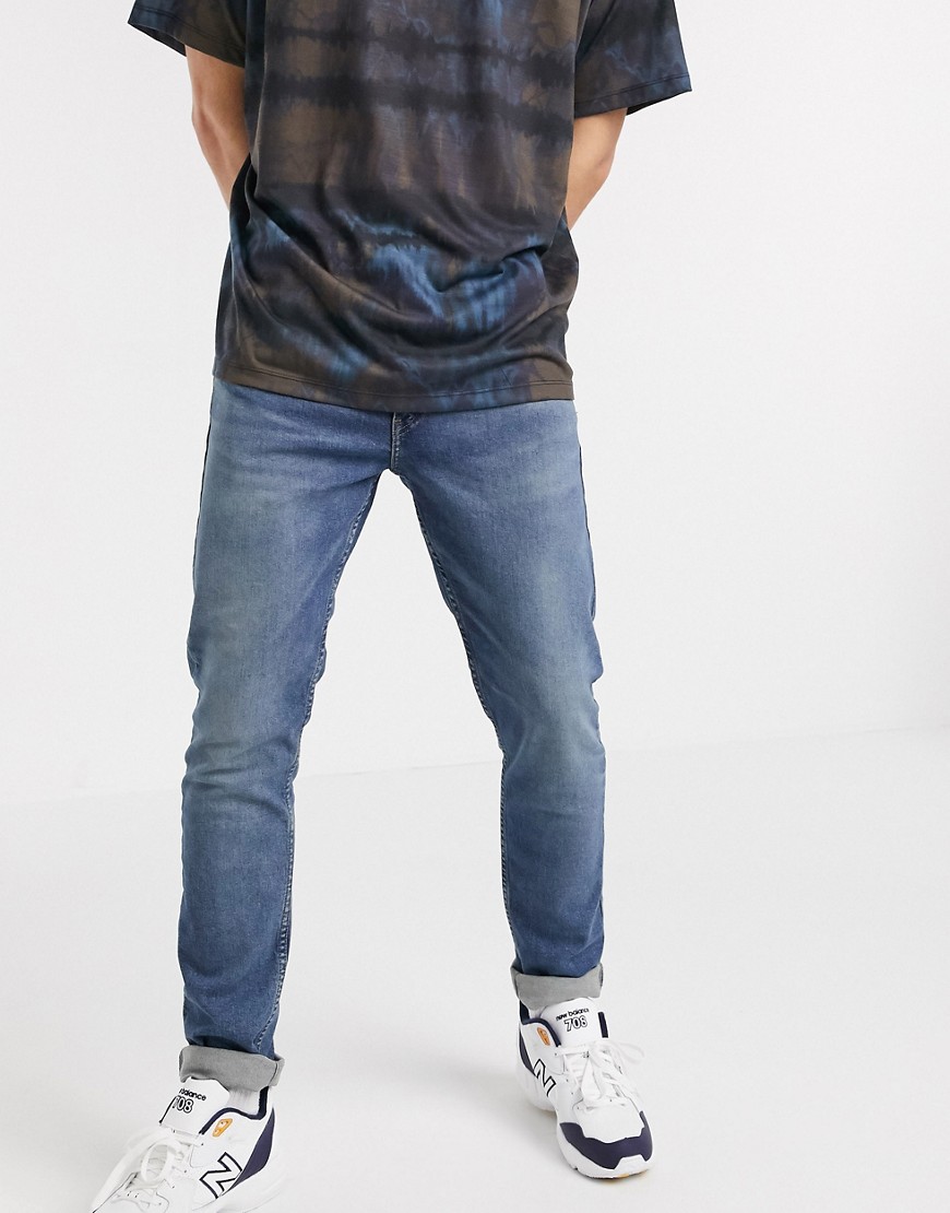 Levi's - Youth - 512 Smaltoelopende lo-ball-jeans met medium wassing in beige-Blauw
