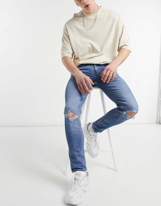 Levi's – Youth 519 – Ljusblå super skinny jeans i hi ball-stil med tvättad finish och slitna detaljer