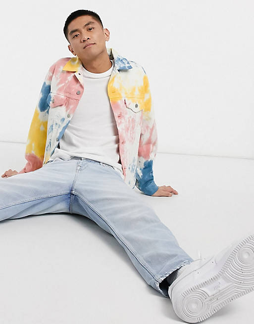 Levi's Youth vintage fit tie dye denim trucker jacket in multi | ASOS