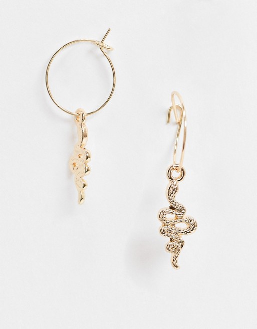 Liars & Lovers gold hoop earrings with snake charm in gold