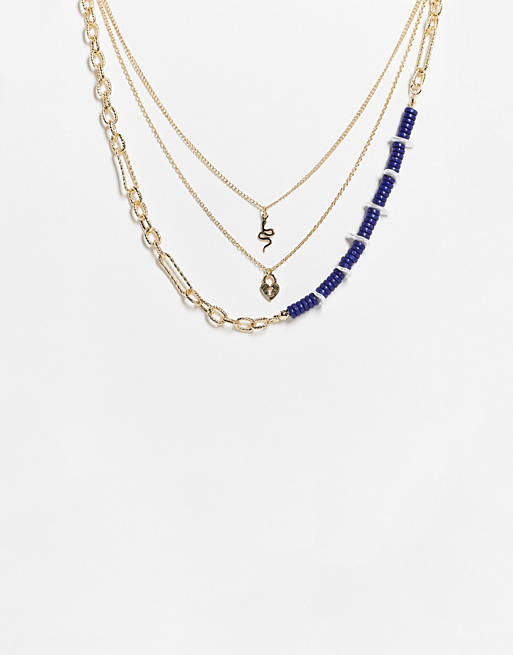Liars & Lovers snake and heart padlock multi row beaded necklace in gold and blue