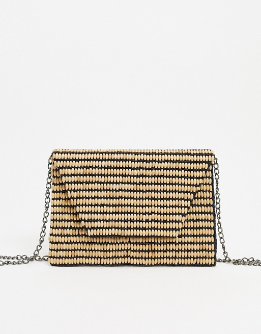 Liars & Lovers wooden beaded clutch bag with strap in beige