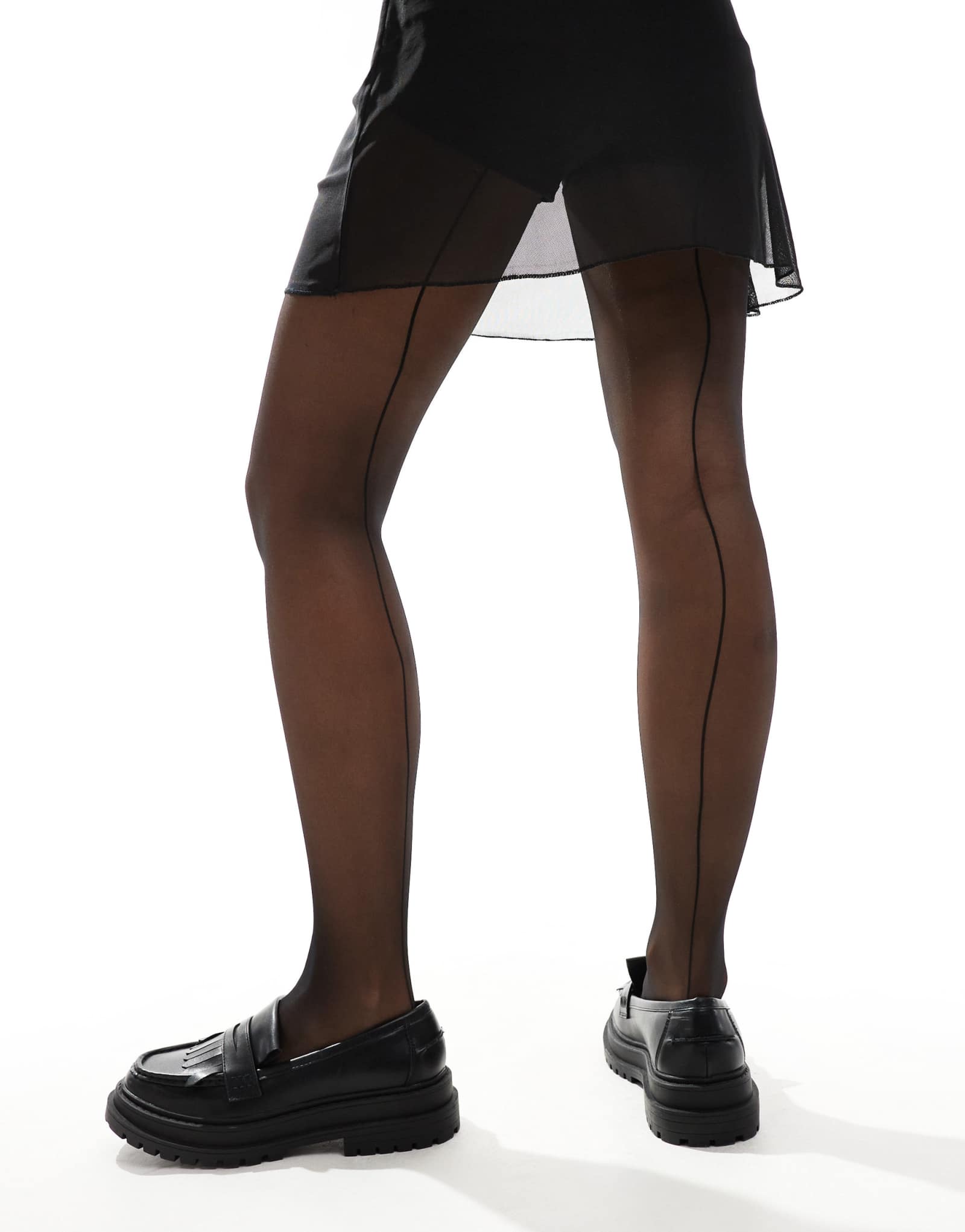 Черные колготки в полоску сзади из материала Lindex 20 денье