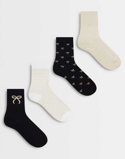 Lindex 4 pack socks in black and gold bows - view 1