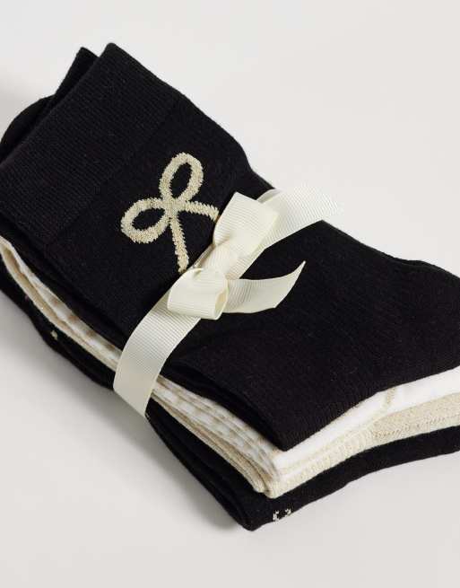Lindex 4 pack socks in black and gold bows, 3 of 3
