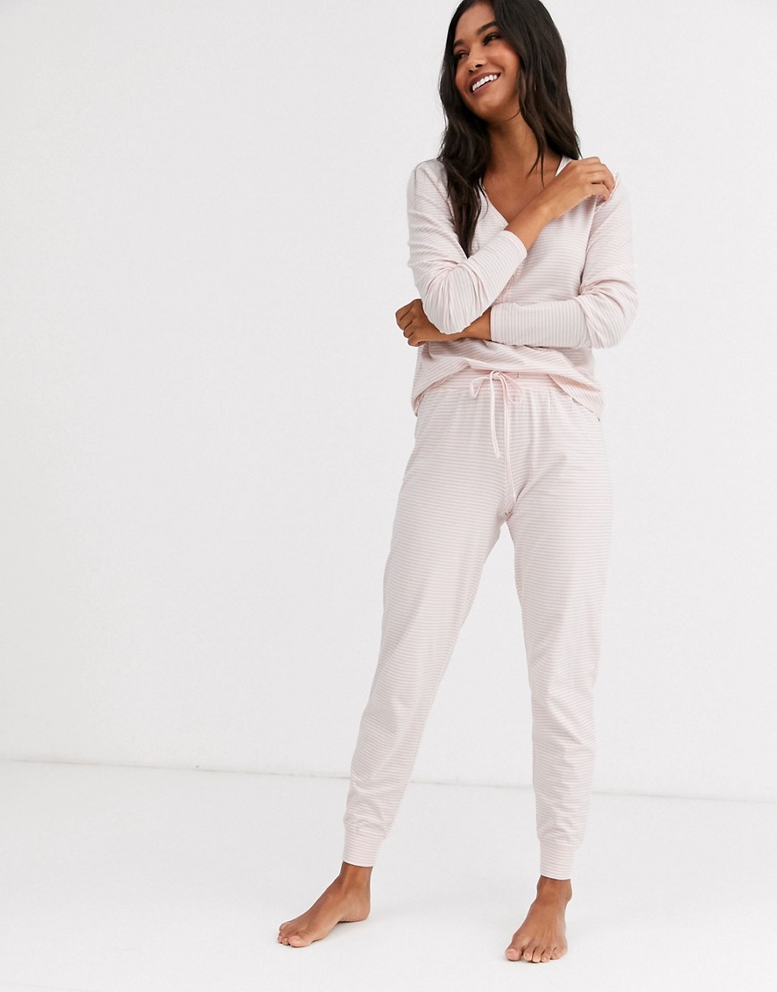 Lindex Amy - Pantaloni del pigiama in cotone organico rosa chiaro a righe