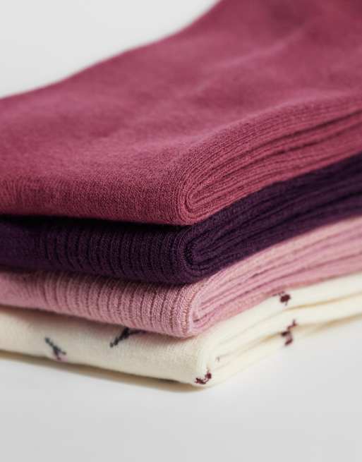 Lindex - pack de 4 calcetines con borde de lechuga, estampado floral y aplique de lazo en rosa empolvado, 2 de 3