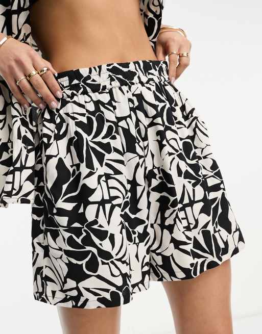 Half white half black on sale shorts