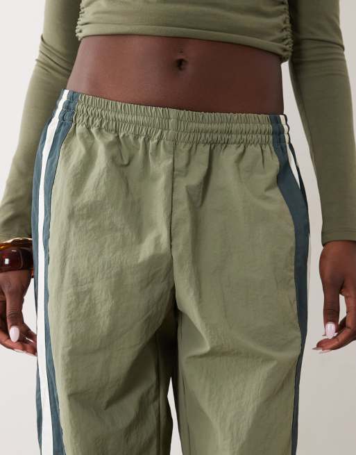 Lioness Aniston side stripe detail nylon windbreaker trousers in khaki, 5 of 5
