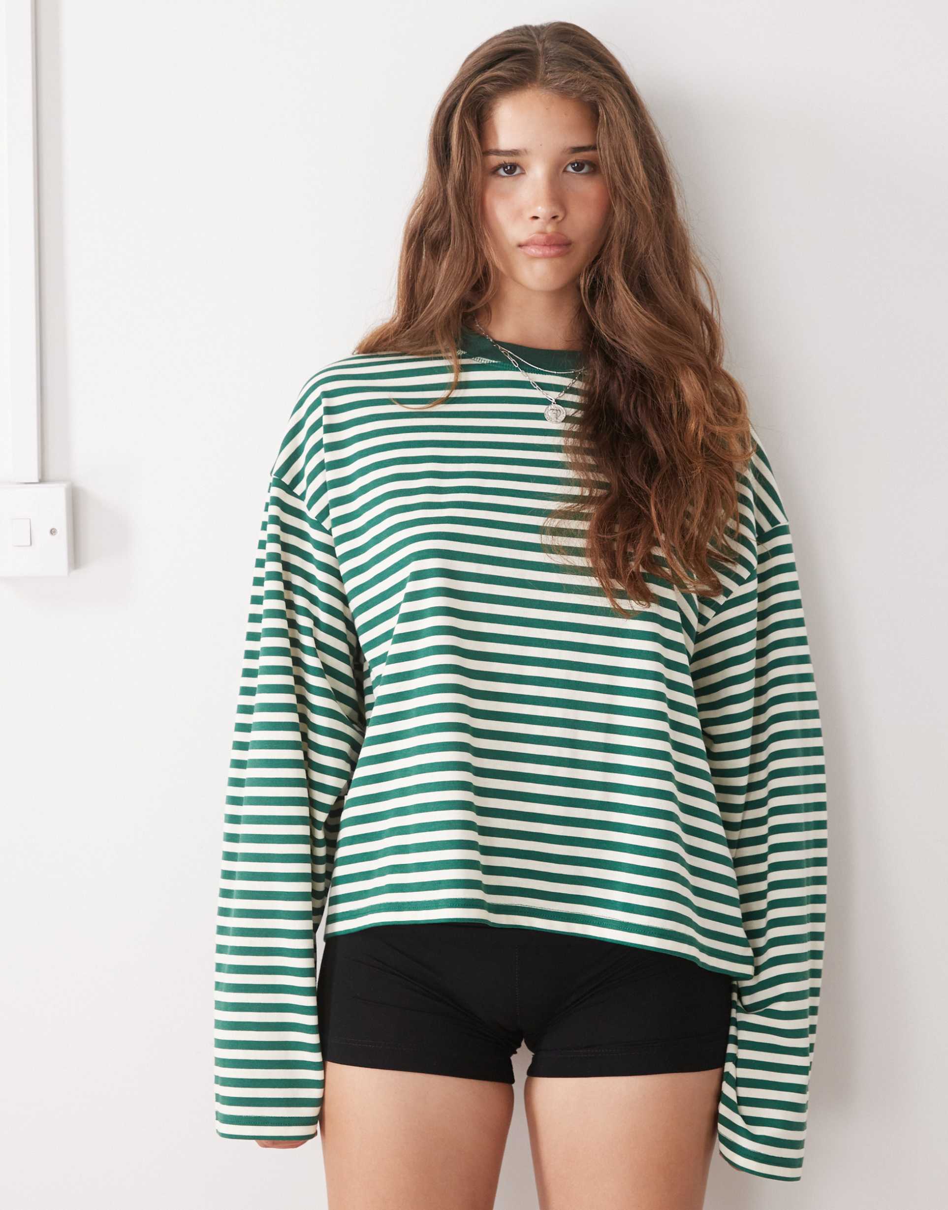 lioness bloom cotton blend long sleeve crew neck boxy t-shirt in forest green & white stripes