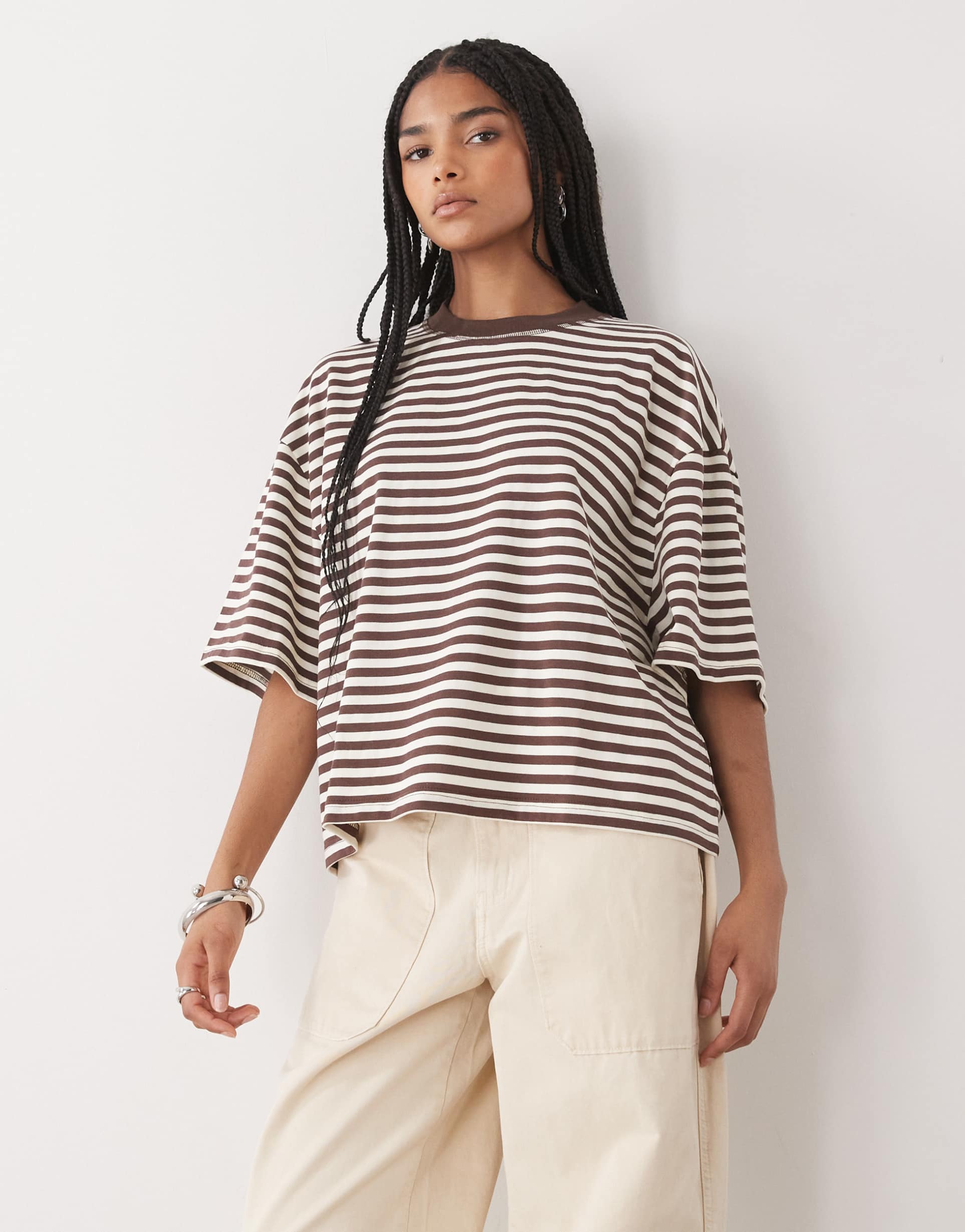 lioness bloom cotton blend short sleeve crew neck boxy t-shirt in dark chocolate stripe