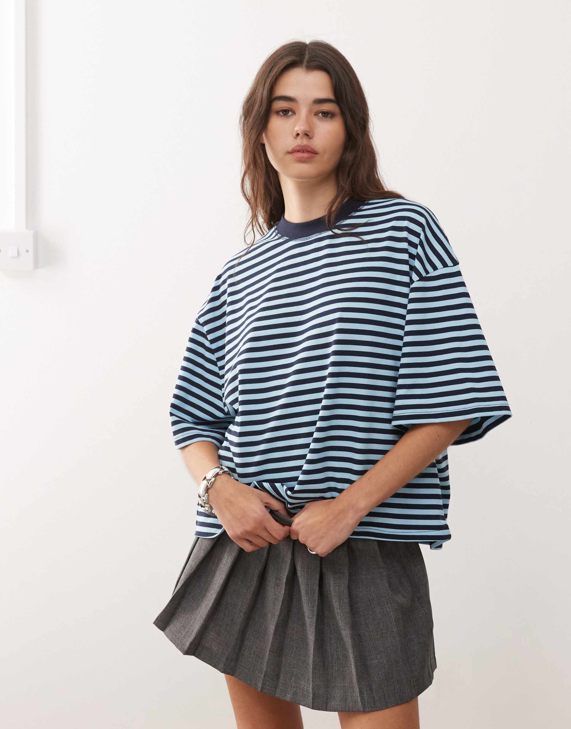 lioness bloom cotton blend short sleeve crew neck boxy t-shirt in navy and sky blue stripe