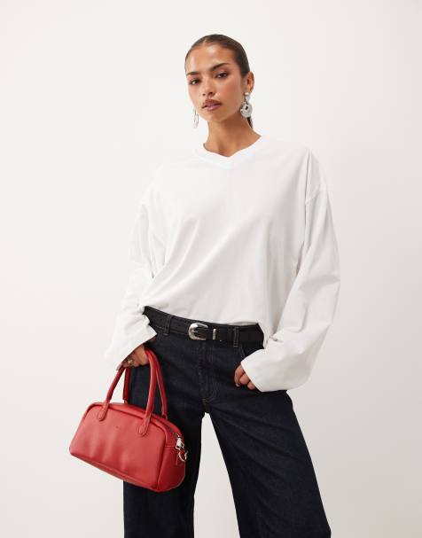 Lioness Bloom v-neck oversized long sleeve t-shirt in white - view 1