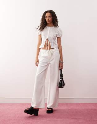 Lioness broderie puff sleeve button down tie detail cropped top and low rise jeans set in white - view 1