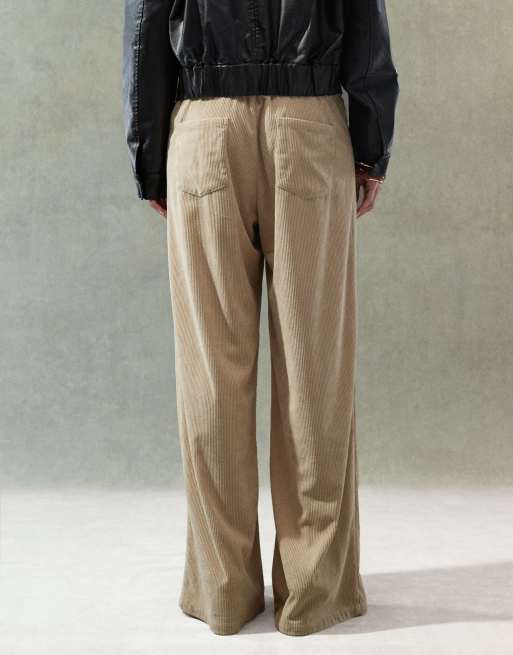 Lioness corduroy slouchy low rise tie detail wide leg trousers in beige