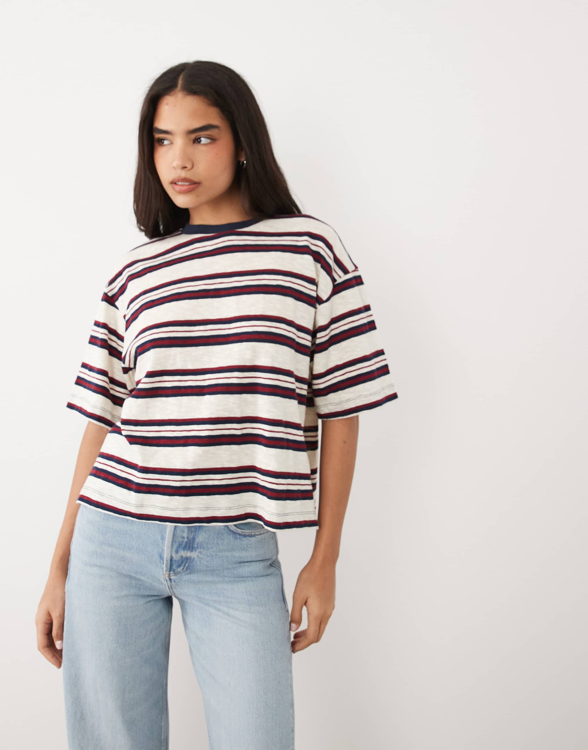lioness emerging cotton oversized short sleeve boxy side slit t-shirt in navy and white stripes