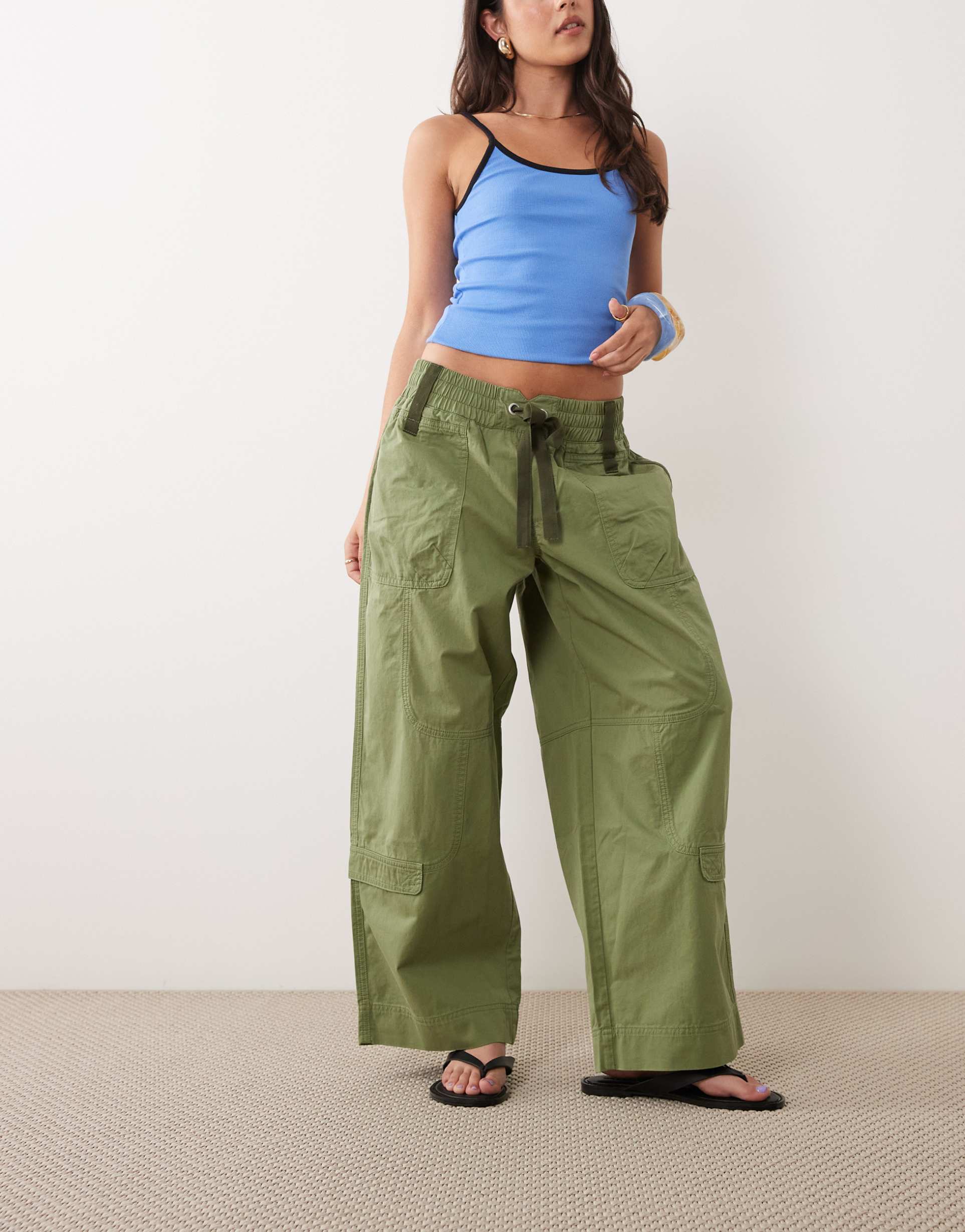 lioness fever cotton shirred tie waist wide leg utility pants in khaki