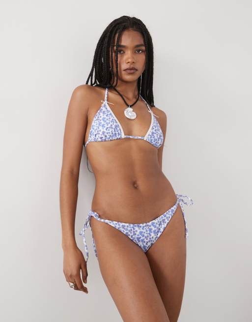 Lioness gisele bow detail contrast trim halterneck bikini top in ditsy blue floral (part of a set)