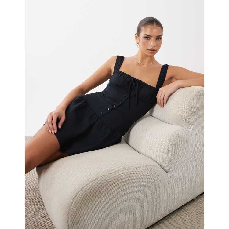 Lioness Heart Shaped linen rich milkmaid button detail gathered skirt mini  dress in navy | ASOS