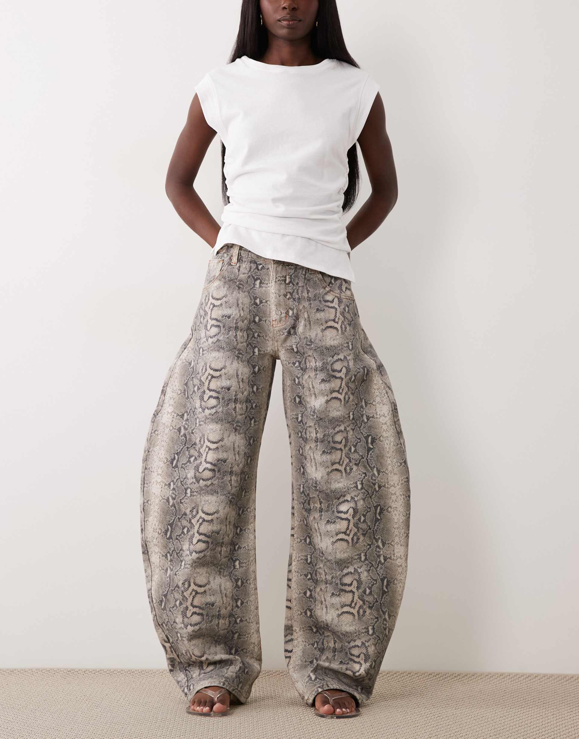 lioness horseshoe barrel leg jeans in snake print