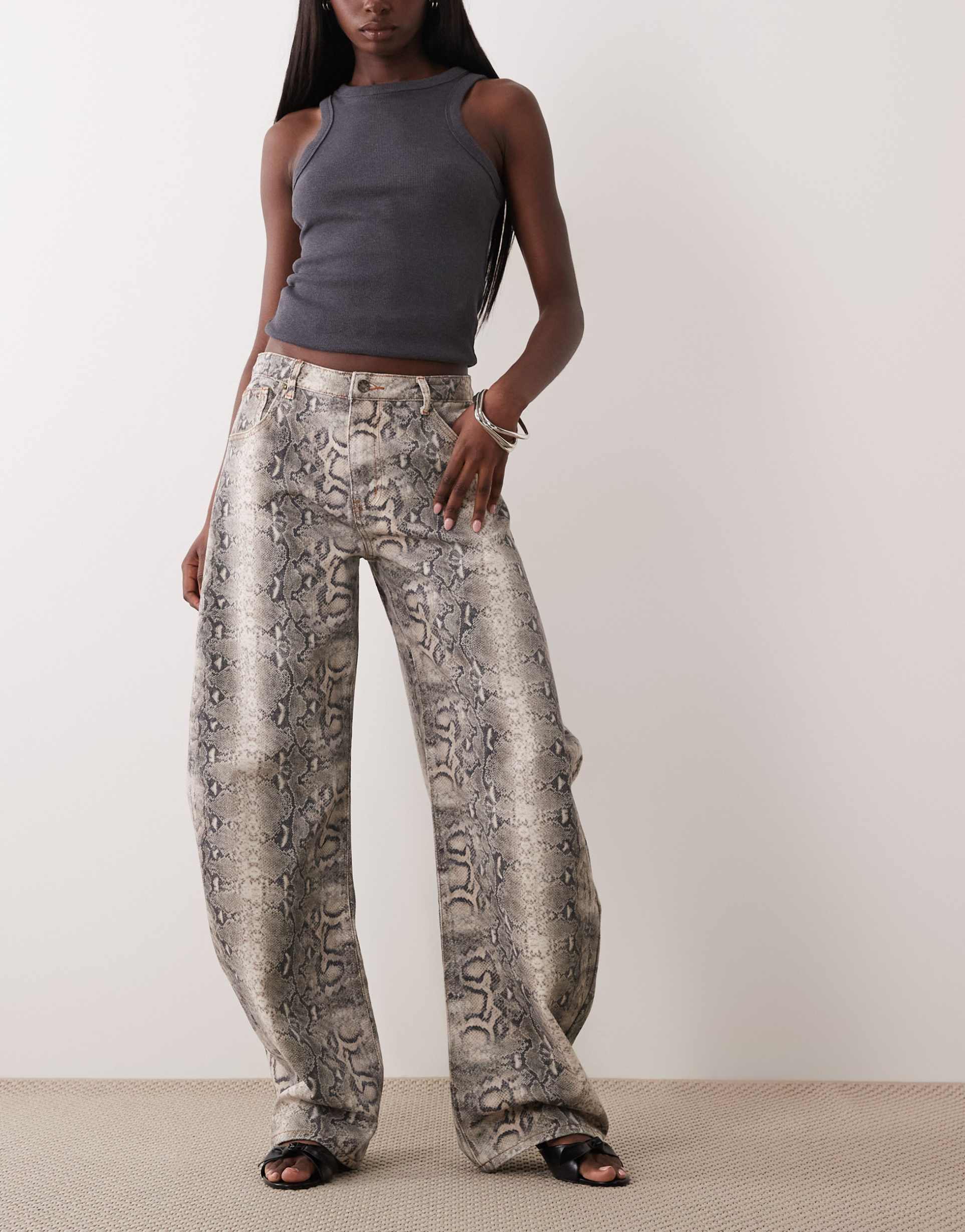 lioness horseshoe barrel leg jeans in snake print