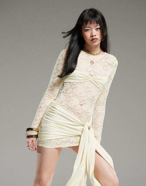 Lioness long sleeve drape tie skirt detail lace mini dress in butter yellow - view 1