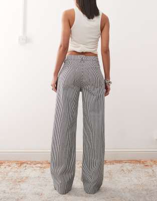 Shop Lioness Low Rise Wide Leg Jeans In Multi
