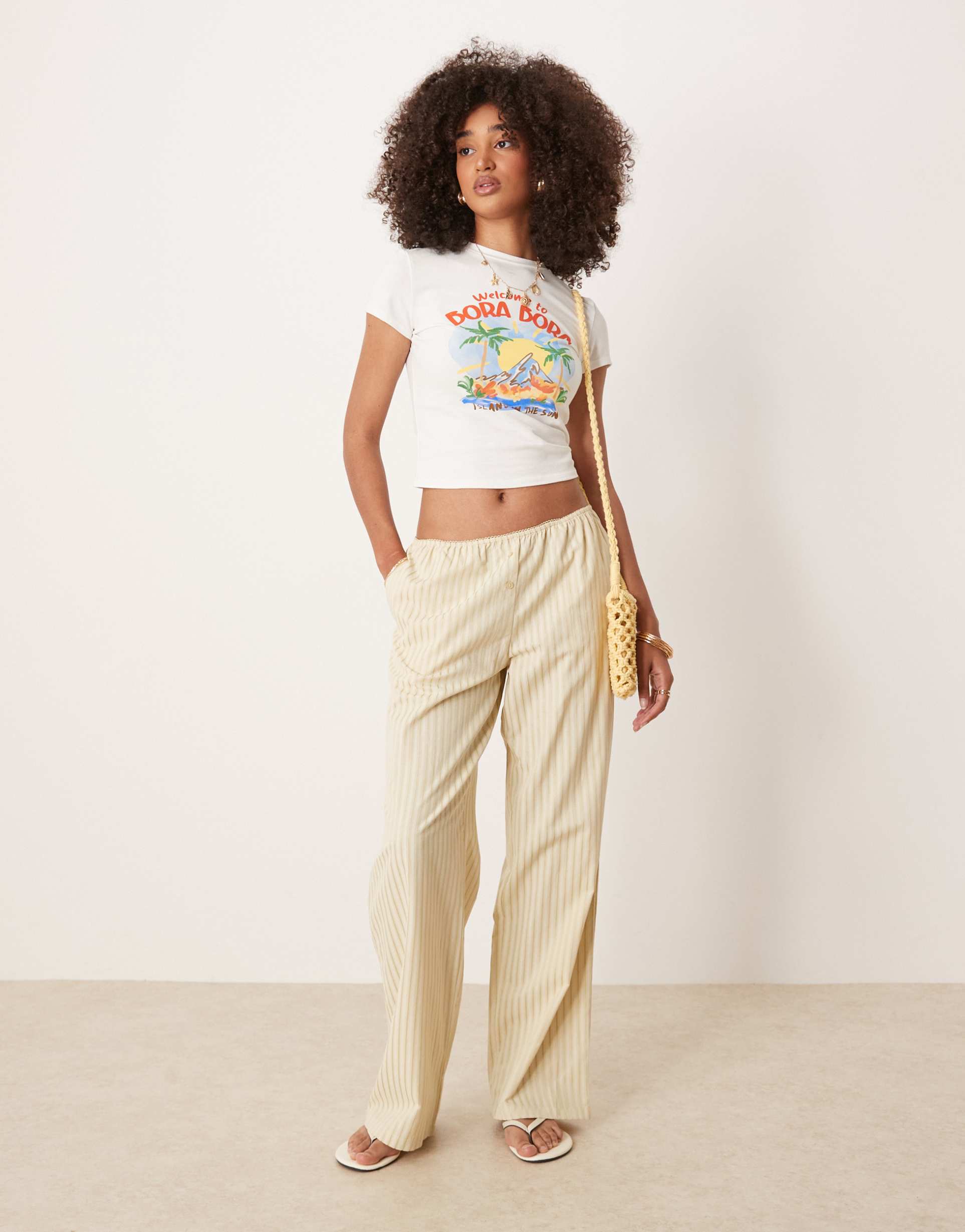lioness low rise wide leg poplin pants in yellow stripe