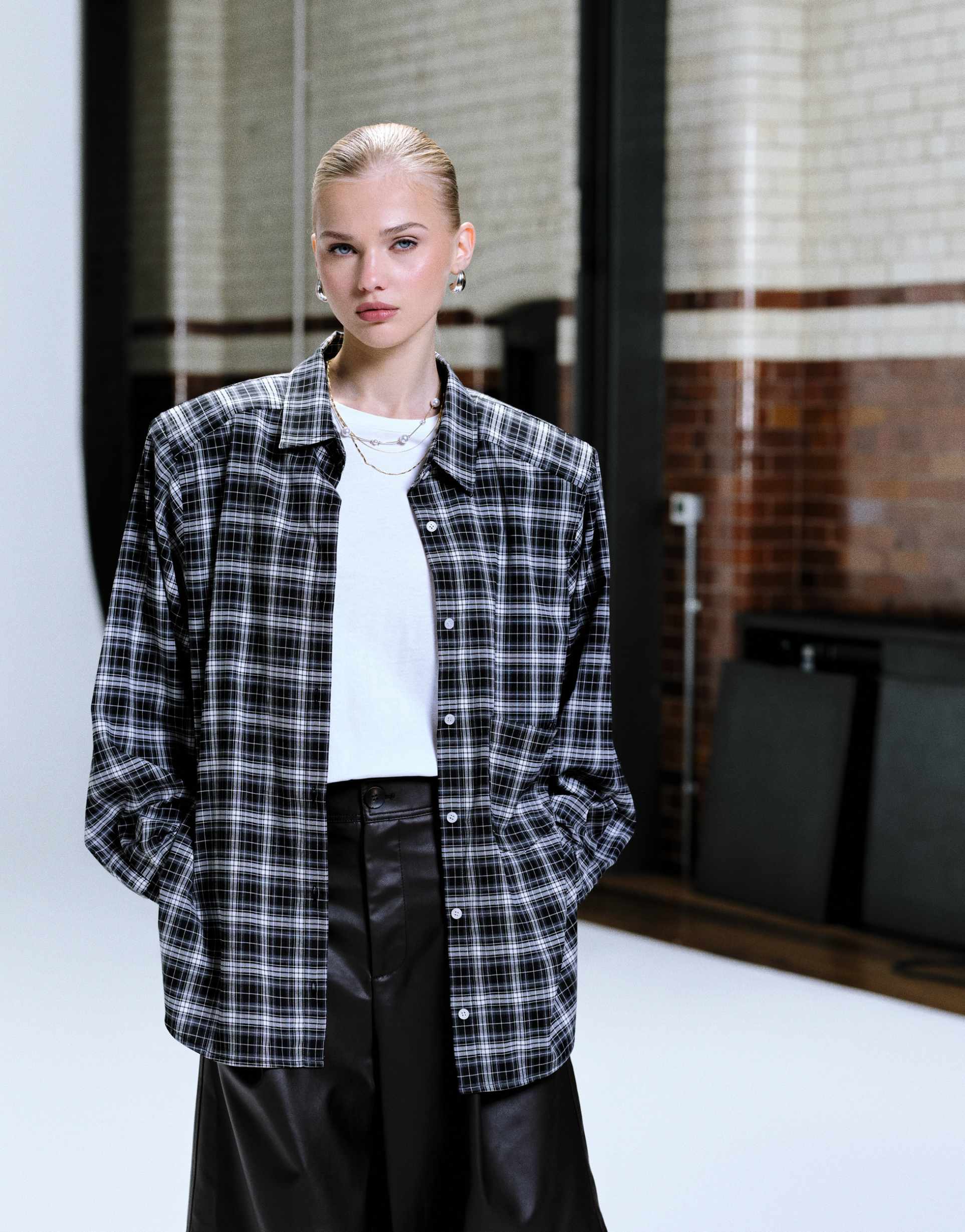 lioness notting hill cotton oversized shoulder pad detailing multiway button front shirt in black plaid