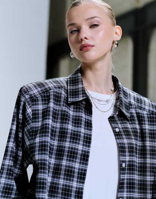 Lioness - Notting Hill - Sort ternet skjorte med skulderpuder og multifunktionel front med knapper i oversized pasform i bomuld, 3 af 4