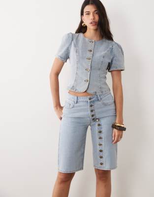 Lioness Penny exclusive asymmetric button detail relaxed leg jorts in light wash denim