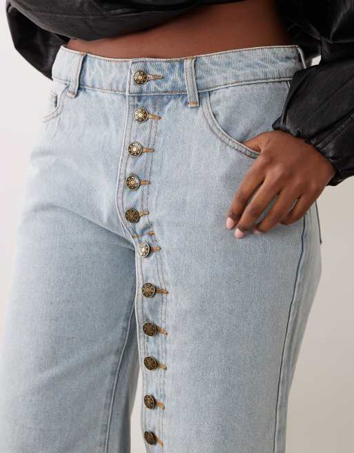 Lioness Penny exclusive asymmetric button detail relaxed leg jorts in light wash denim, 4 of 5
