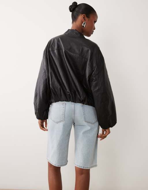 Lioness Penny exclusive asymmetric button detail relaxed leg jorts in light wash denim, 5 of 5
