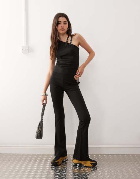 Lioness Rebel asymmetric shoulder buckle strap detail tank top and buckle detail pants set in black - view 1
