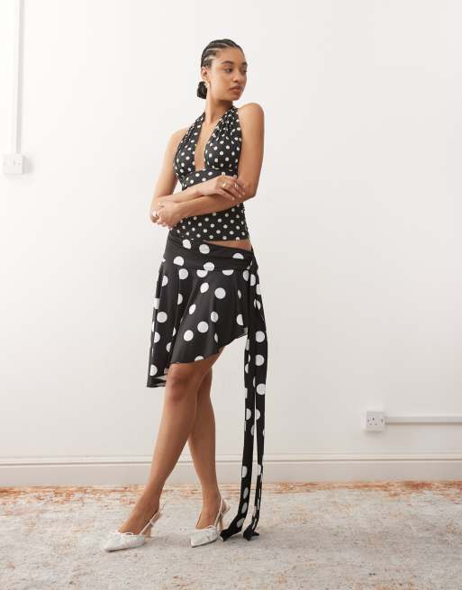Lioness Safari plunge halterneck top and asymmetric midi skirt co-ord in black polka