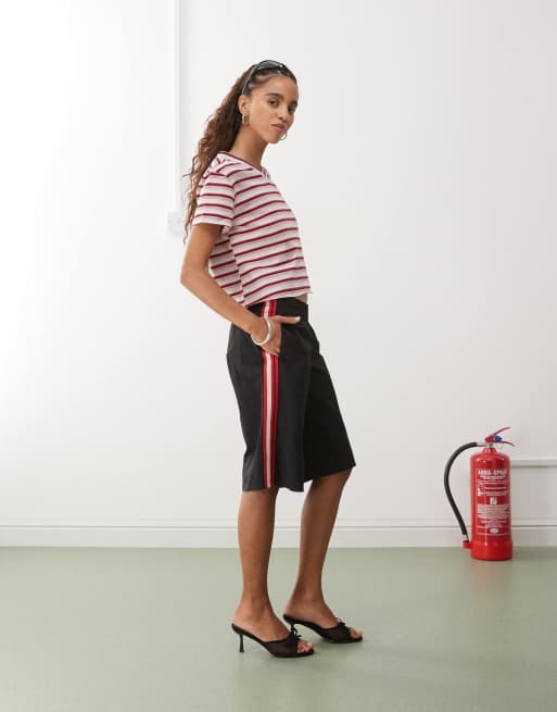 Lioness sevigney elastic waist side stripe windbreaker jorts in black - part of a set