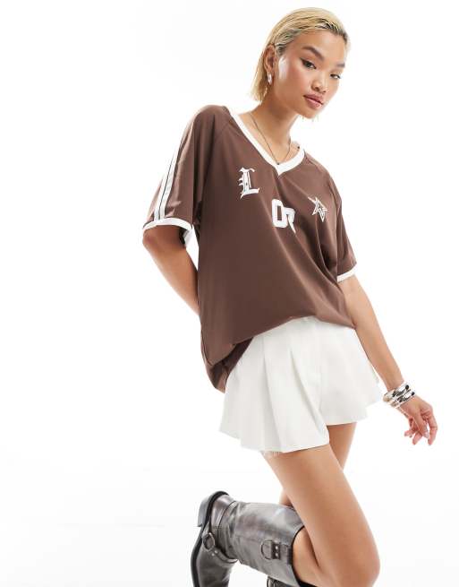 Lioness - Top stile maglia sportiva marrone con finiture bianche a contrasto e scollo a V