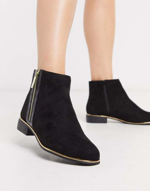 Black boots with gold zip sale